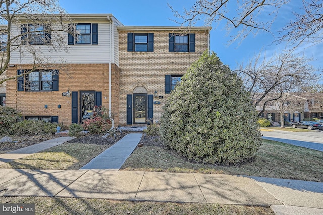 multi unit property featuring brick siding