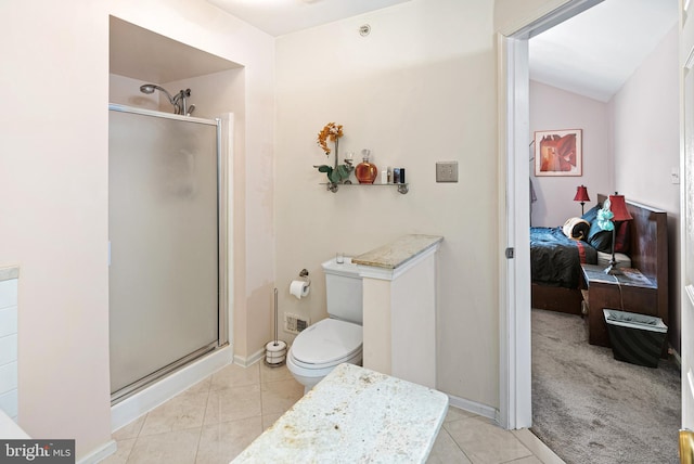 bathroom with tile patterned floors, ensuite bath, and a stall shower