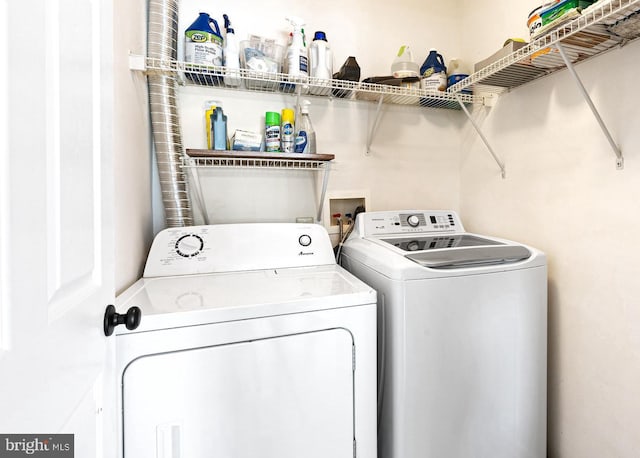 laundry area featuring laundry area and separate washer and dryer