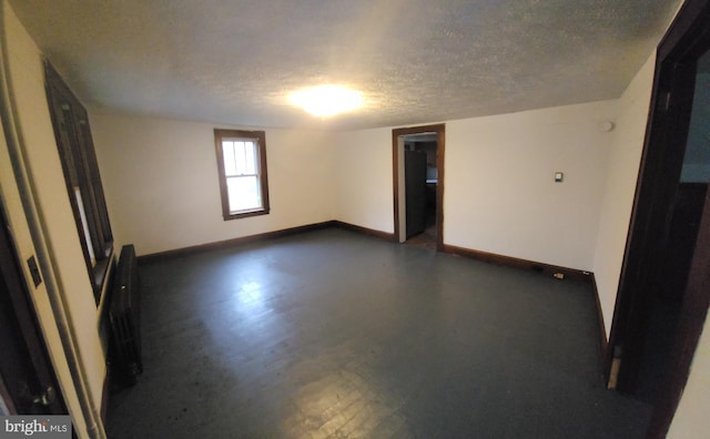 15941 Foundry Row NW, Mount Savage, MD 21545 - empty room featuring baseboards and a textured ceiling