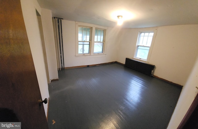 15941 Foundry Row NW, Mount Savage, MD 21545 - unfurnished room with radiator and dark wood-type flooring
