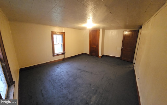 15941 Foundry Row NW, Mount Savage, MD 21545 - empty room featuring baseboards and dark colored carpet
