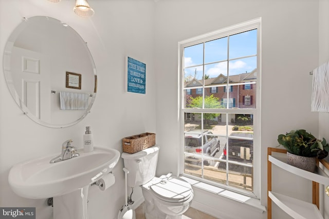 bathroom with a sink and toilet