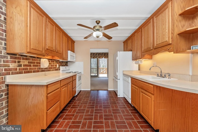 kitchen featuring white appliances, baseboards, open shelves, a sink, and light countertops