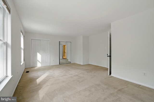 11807 Bare Sky Ln, Columbia, MD 21044 - interior space featuring baseboards, visible vents, and a wealth of natural light