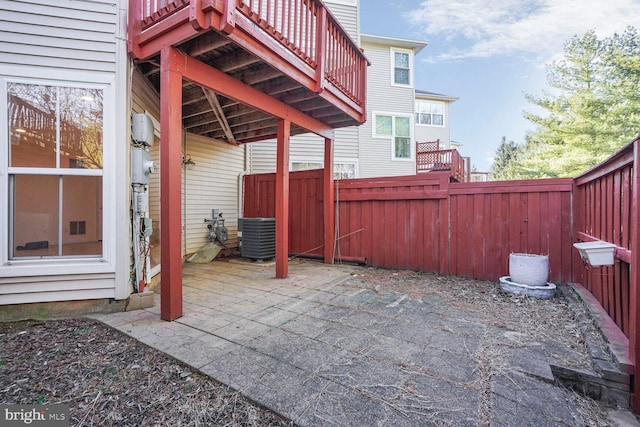 view of patio / terrace with a fenced backyard and central AC