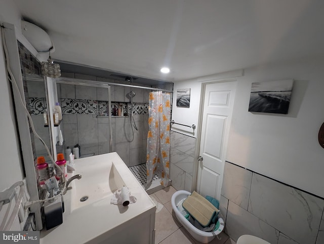 full bathroom with recessed lighting, tile walls, a stall shower, and vanity