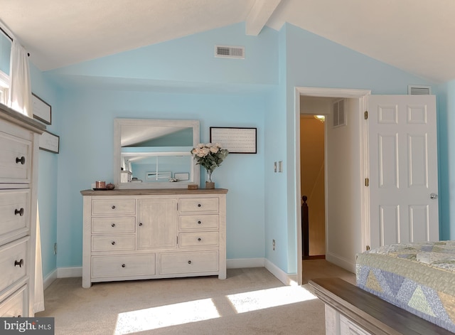 unfurnished bedroom with lofted ceiling with beams, visible vents, and light carpet