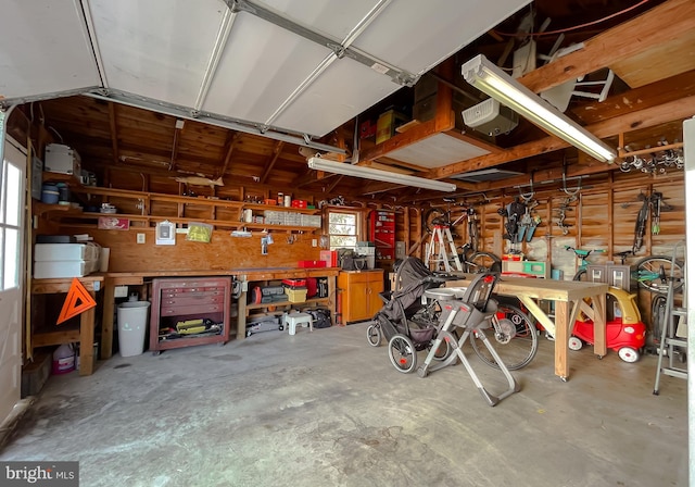 garage with a workshop area