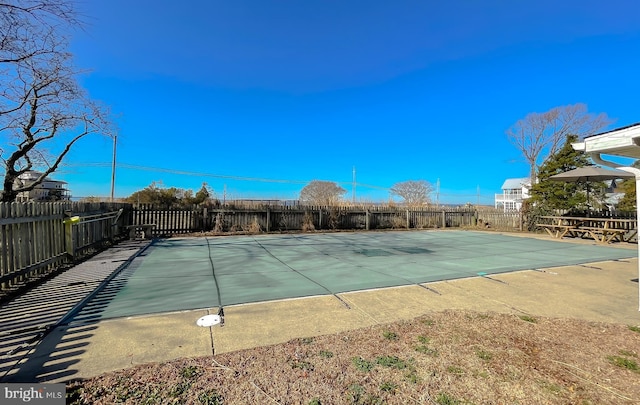 view of pool with a fenced in pool, a patio, and a fenced backyard