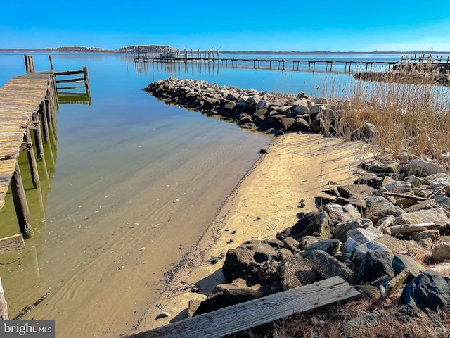 view of dock with a water view