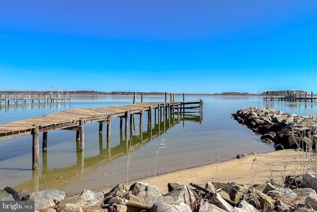 dock area featuring a water view