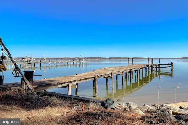 view of dock with a water view