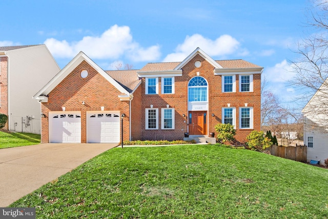 view of front facade featuring a front lawn, concrete driveway, an attached garage, and fence