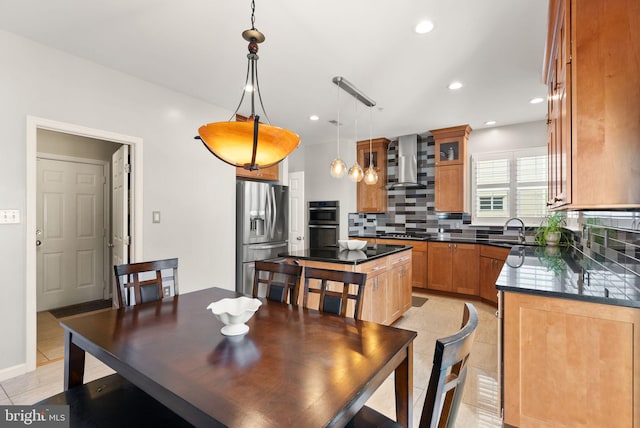 dining space featuring light tile patterned floors and recessed lighting