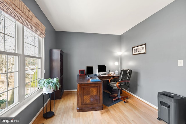 office with light wood finished floors and baseboards