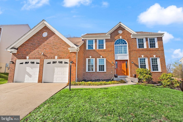 view of front of house with concrete driveway, an attached garage, brick siding, and a front yard