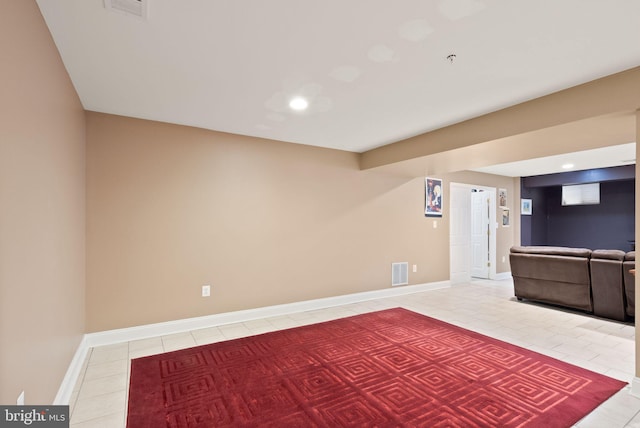 unfurnished room with light tile patterned floors, visible vents, baseboards, and recessed lighting