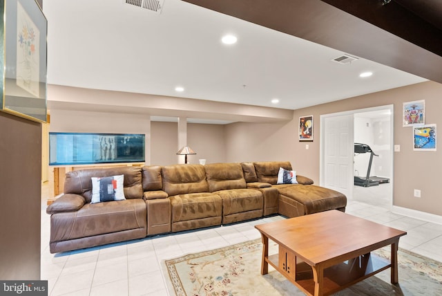 living area featuring light tile patterned floors, visible vents, and recessed lighting