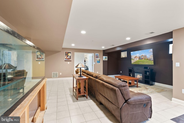 living room featuring recessed lighting, visible vents, and light tile patterned flooring