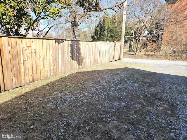 view of yard with fence