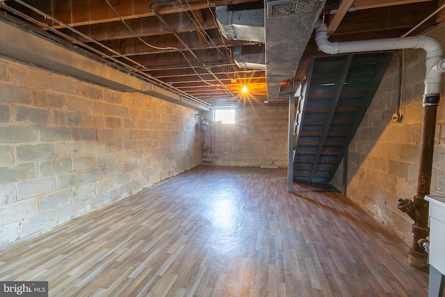 basement with wood finished floors