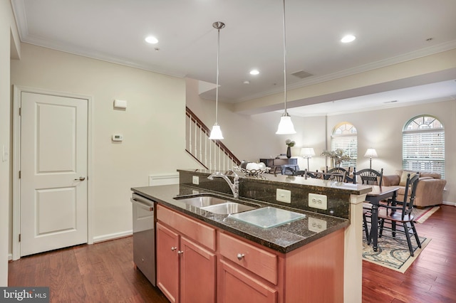 kitchen with an island with sink, dark wood-style flooring, a sink, dishwasher, and open floor plan