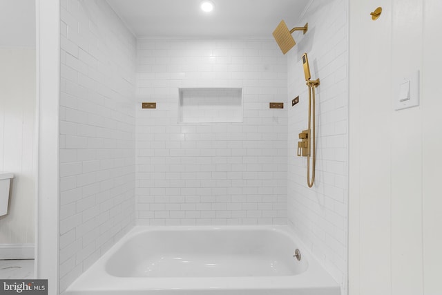 bathroom with tub / shower combination