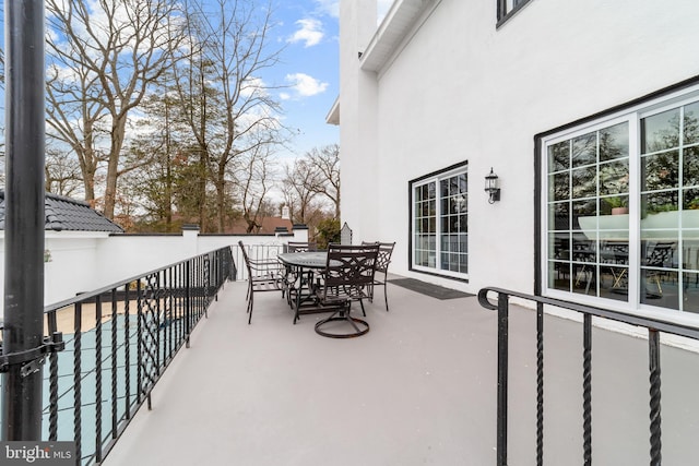 exterior space with outdoor dining area