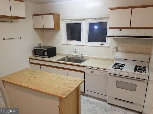 4408 Sherwood Rd, Philadelphia, PA 19131 - kitchen featuring white appliances, light countertops, marble finish floor, and a sink