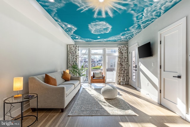 sitting room featuring wood finished floors and baseboards