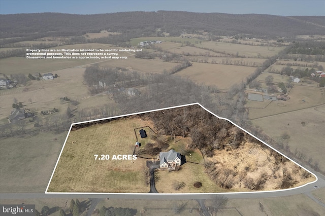 birds eye view of property featuring a rural view