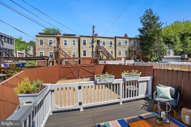 wooden terrace featuring fence private yard