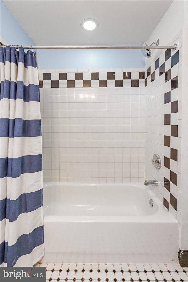 full bathroom with shower / tub combo