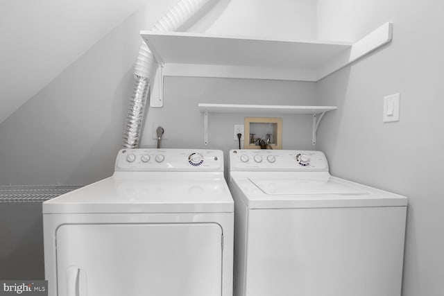 laundry area featuring independent washer and dryer and laundry area