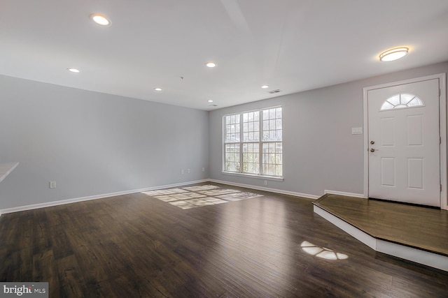 entrance foyer with recessed lighting, wood finished floors, visible vents, and baseboards