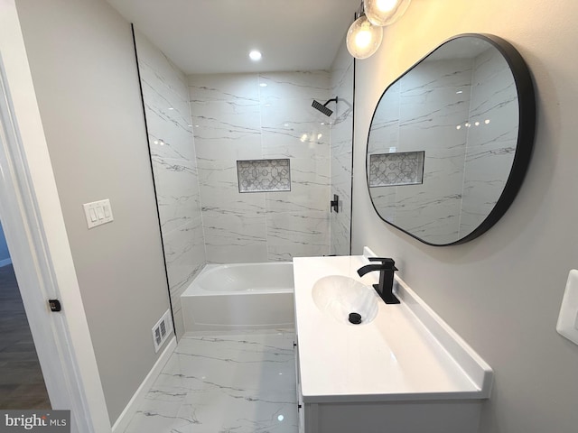 bathroom with baseboards, recessed lighting, bathing tub / shower combination, marble finish floor, and vanity