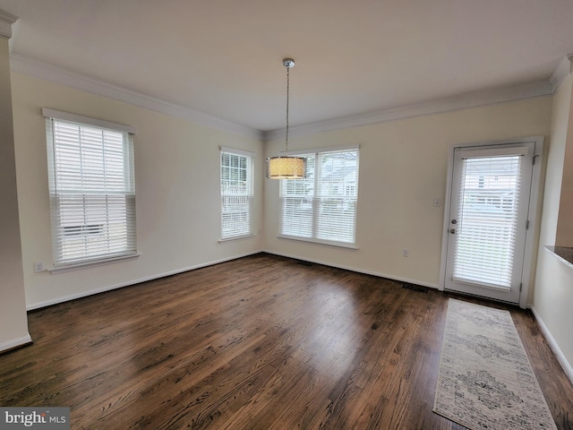 unfurnished dining area with baseboards, dark wood-style flooring, and ornamental molding