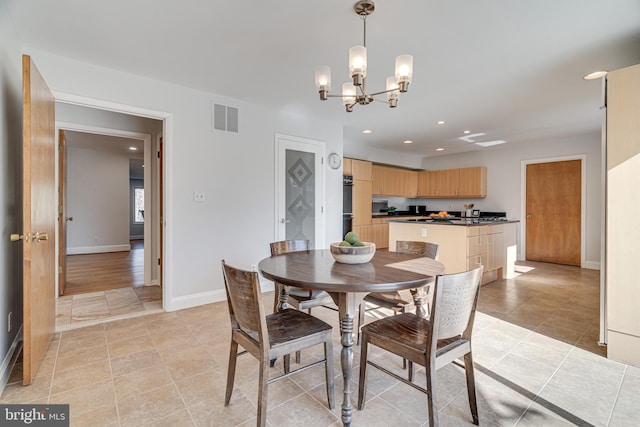 dining area with recessed lighting, visible vents, baseboards, and a notable chandelier