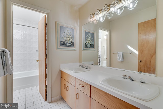 bathroom with tile patterned flooring, double vanity, washtub / shower combination, and a sink