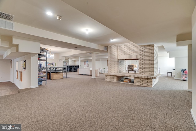 unfurnished living room featuring visible vents, carpet floors, and baseboards