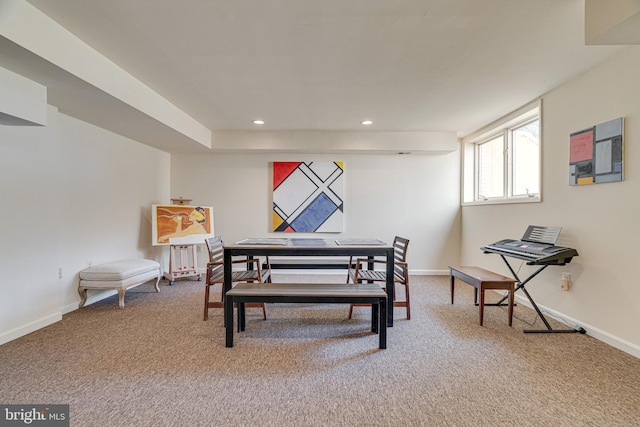 carpeted dining space with recessed lighting and baseboards