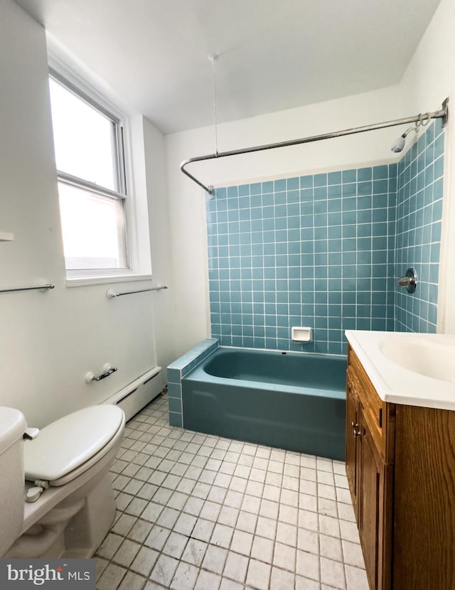 full bath with vanity, a baseboard radiator, tile patterned flooring, bathing tub / shower combination, and toilet