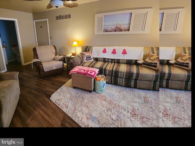 living area with visible vents, baseboards, wood finished floors, and a ceiling fan