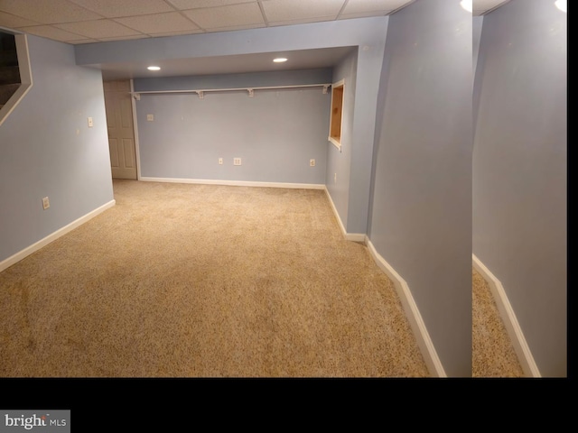 finished basement with recessed lighting, carpet, a paneled ceiling, and baseboards