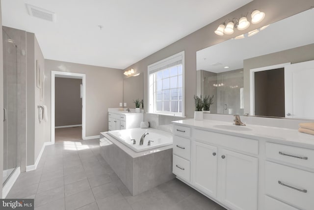 bathroom with tile patterned flooring, visible vents, a shower stall, a bath, and a sink