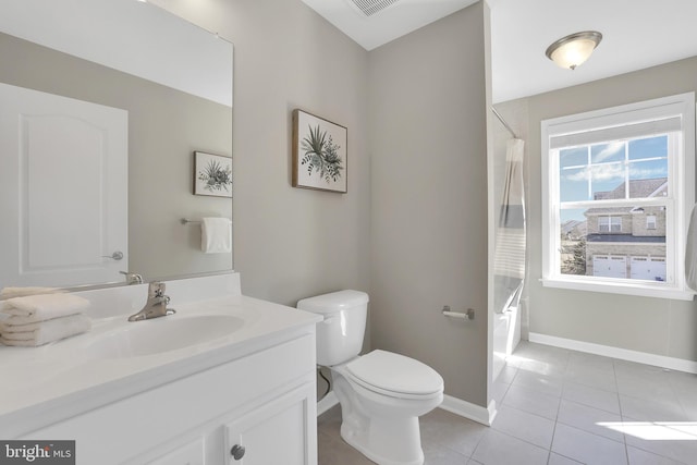 full bath with tile patterned flooring, baseboards, toilet, bathtub / shower combination, and vanity