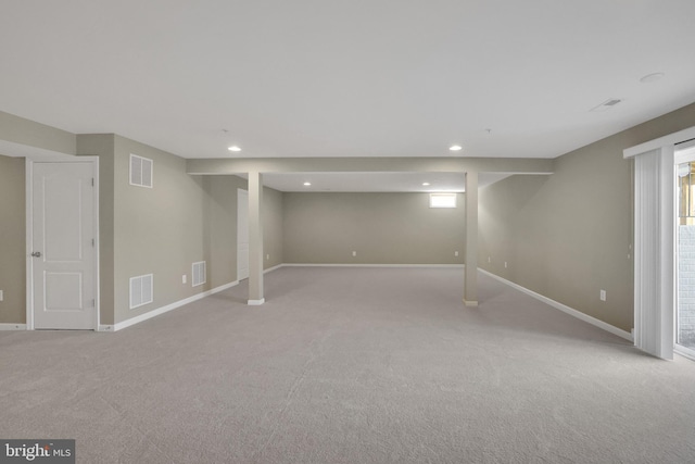 basement with visible vents, recessed lighting, and baseboards