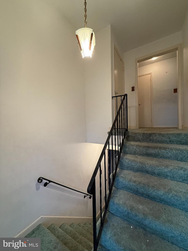 stairs with baseboards