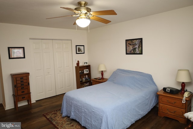 bedroom featuring wood finished floors, a closet, and ceiling fan